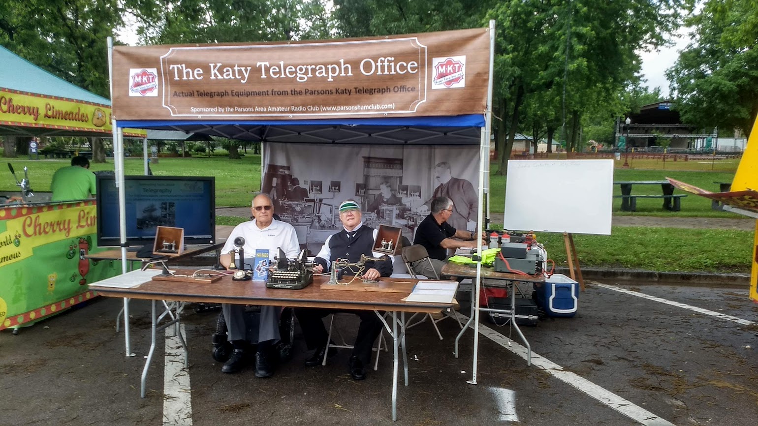 Rick and Bob demonstrating amateur radio equipment at the Katy Days festival